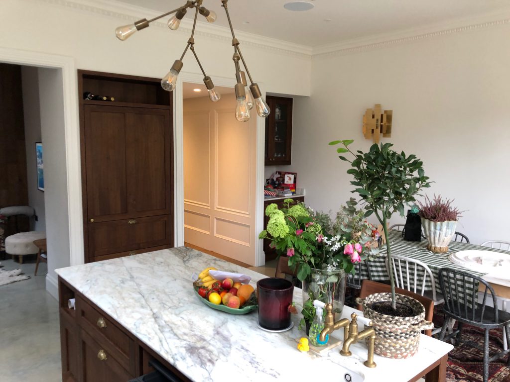 Traditional walnut shaker kitchen in Finchley, light feature